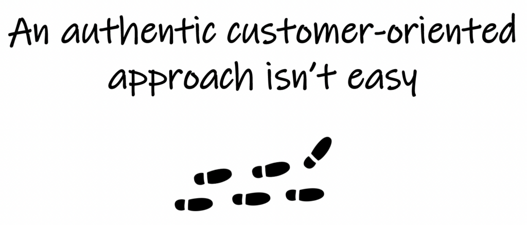 Text: “An authentic customer-oriented approach isn’t easy.” And a drawing of six footsteps going to the right.